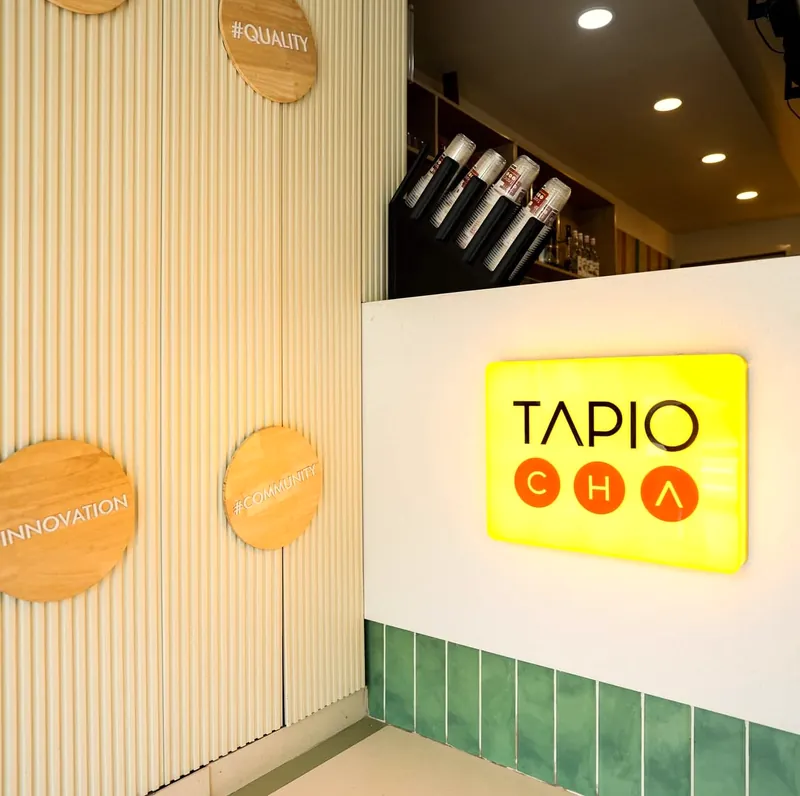 The Tapiocha counter and lit sign at Jubilee Walk