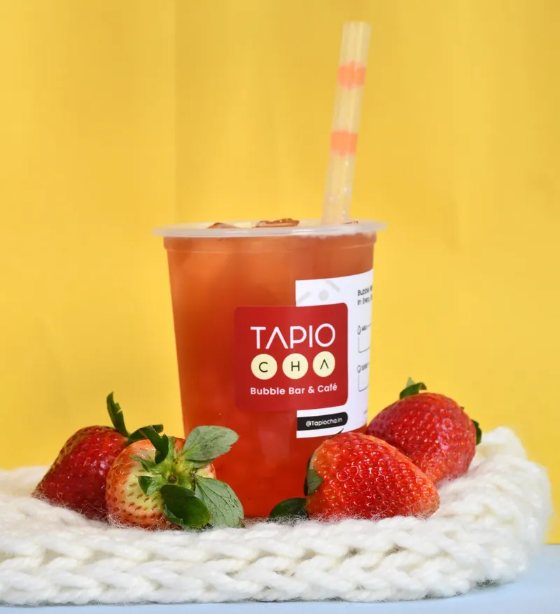 Strawberry fruit tea with fresh strawberries